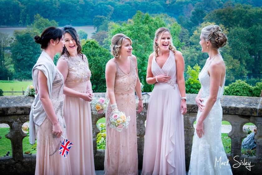Bride and bridesmaids in blush gowns - Mark Sisley Photography