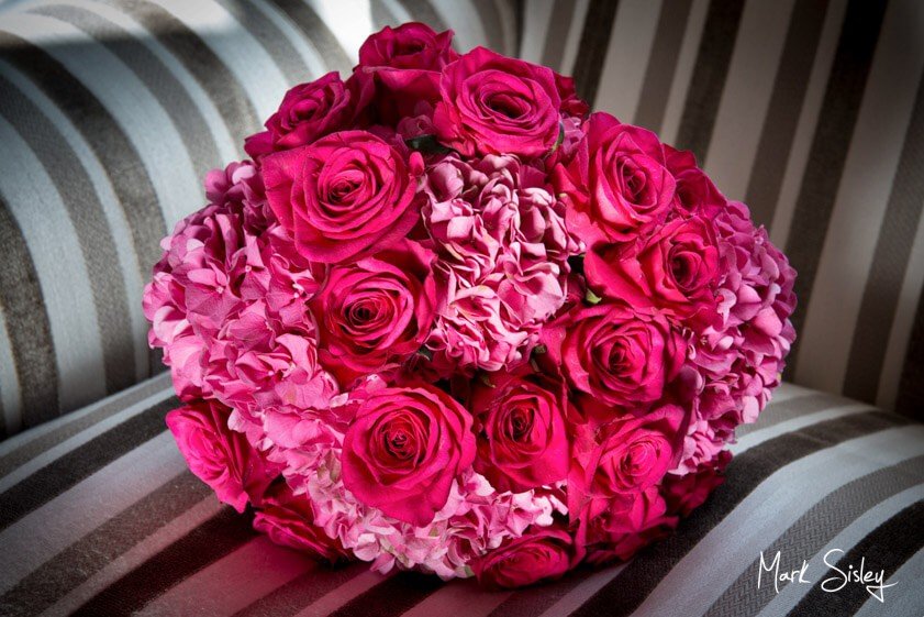 bouquet of hot pink roses and hydrangeas - Mark Sisley Photography