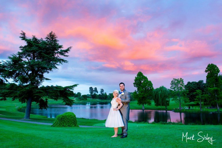 Bride and groom at sunset at Brocket Hall - Mark Sisley Photography