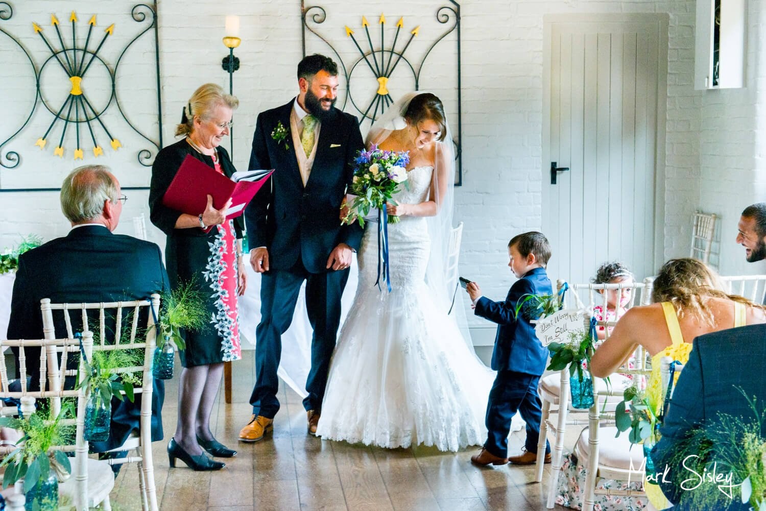 Five Arrows Waddesdon wedding pageboy having issues with his camera