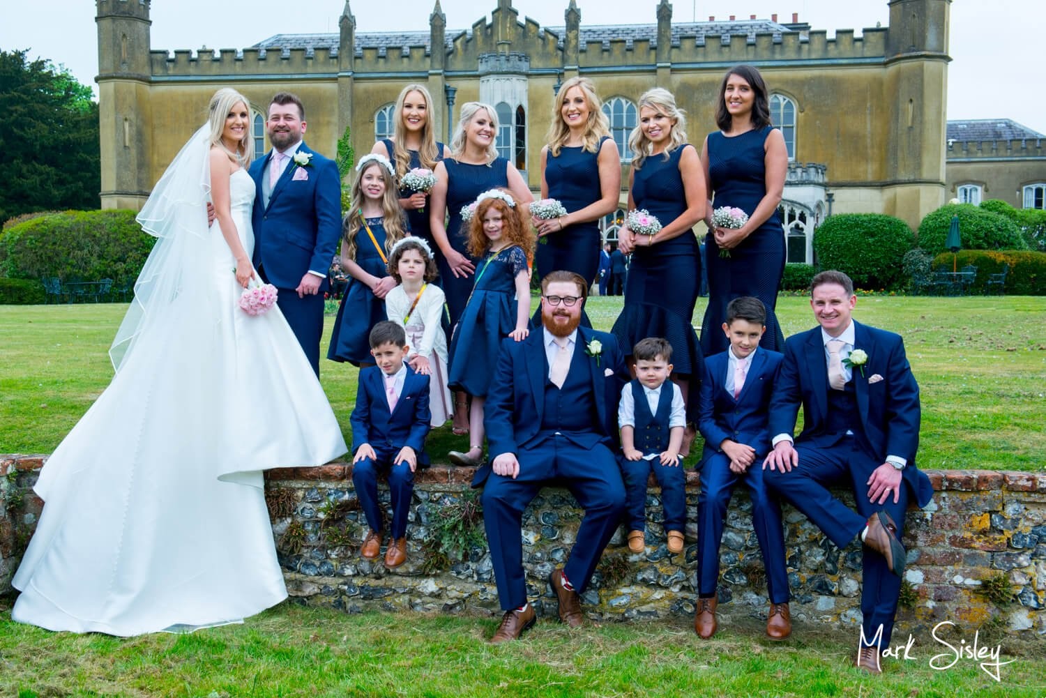 Missenden Abbey summer's wedding day pose with the bridal party