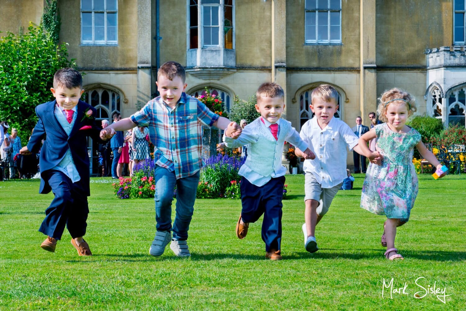 Children having fun at Missenden Abbey wedding celebration