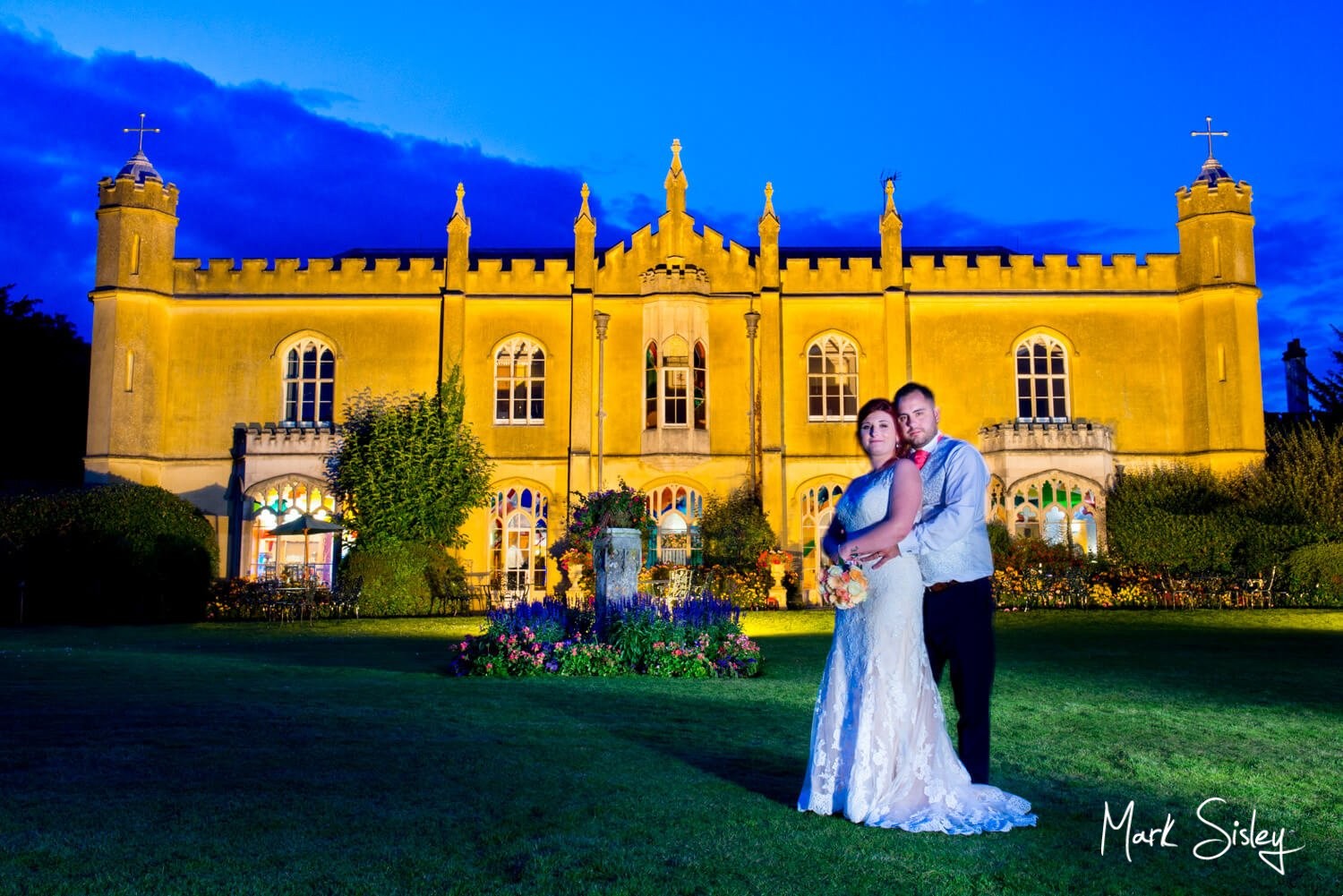 Missenden Abbey wedding celebrations comes to a close with this dramatic floodlit pose