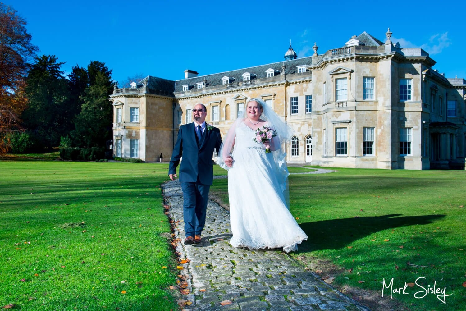 Hartwell House autumn wedding photography under perfect blue skies