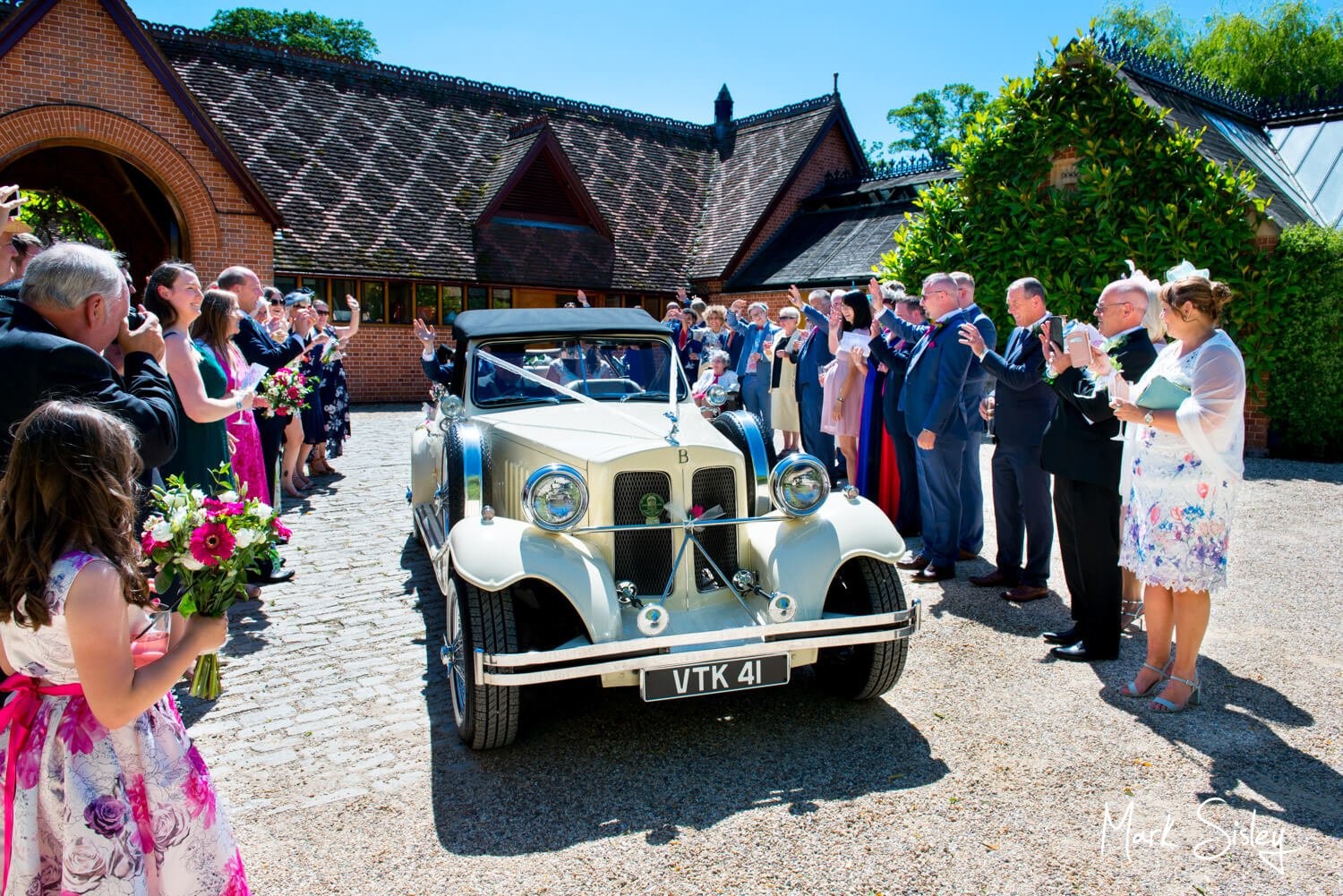 Dairy Waddesdon wedding car aisle on this couple's special day