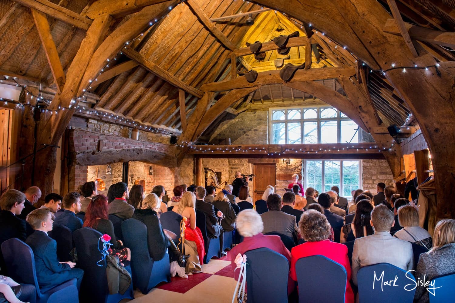 Rustic barn interior at Notley Tythe Barn wedding