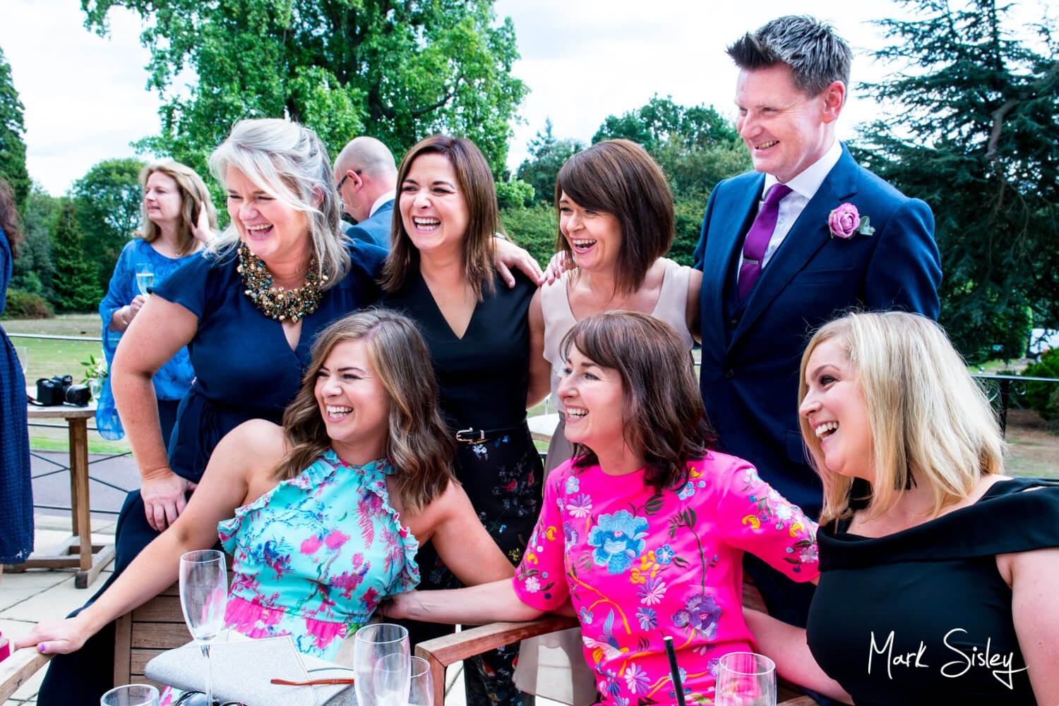 Taplow House Hotel wedding photos of some guests on the terrace