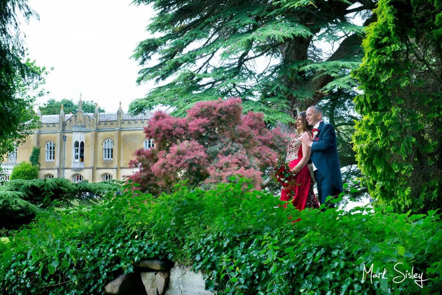 Missenden Abbey wedding blog - Newlyweds on the bridge