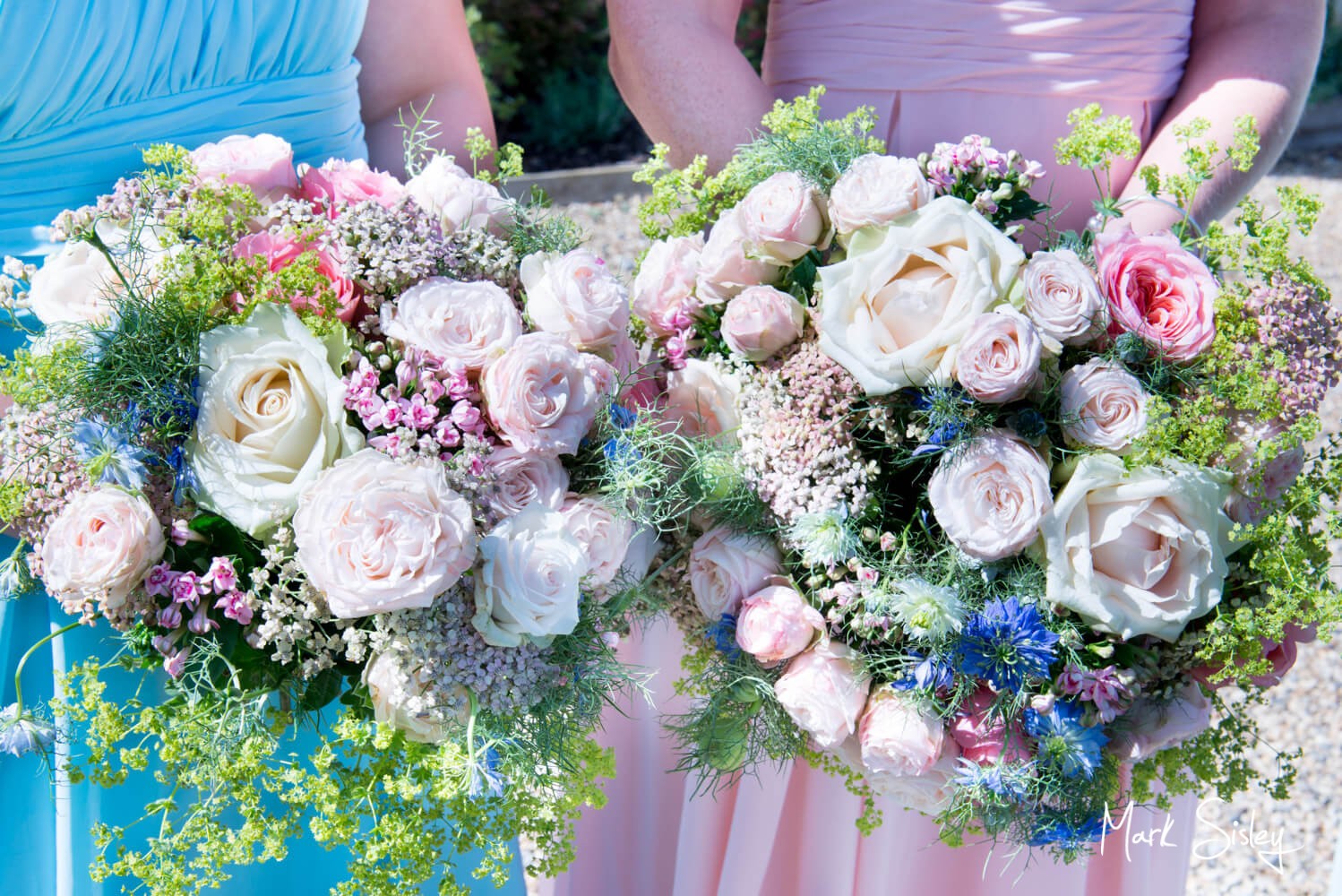 Bridesmaids flowers at Notley Tythe Barn wedding
