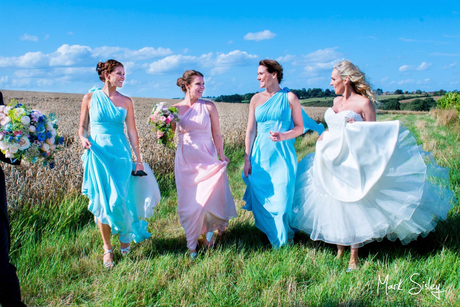 Walking in the grounds at Notley Tythe Barn wedding