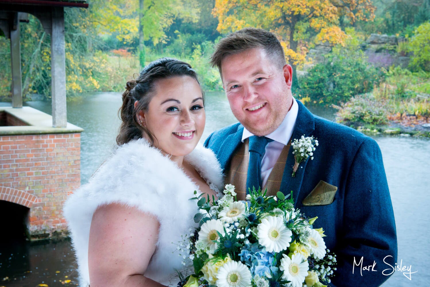 Waddesdon Dairy winter wedding portrait in the rain