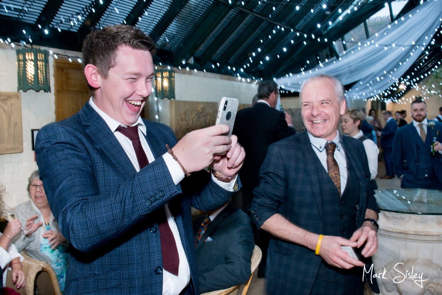 The magian planning his next trick at Waddesdon Dairy winter wedding 