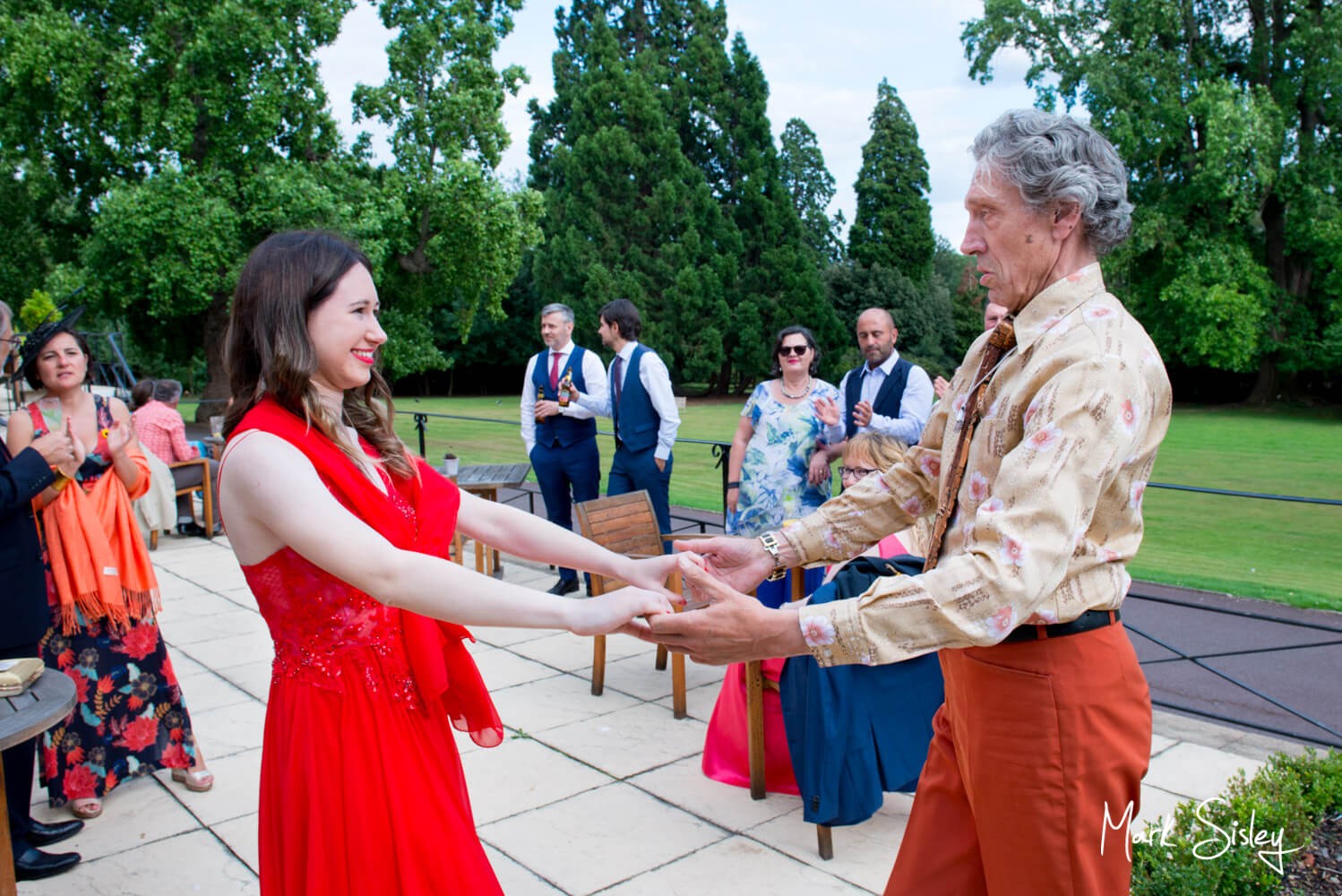 Dancing on the terrace at Taplow House Hotel wedding