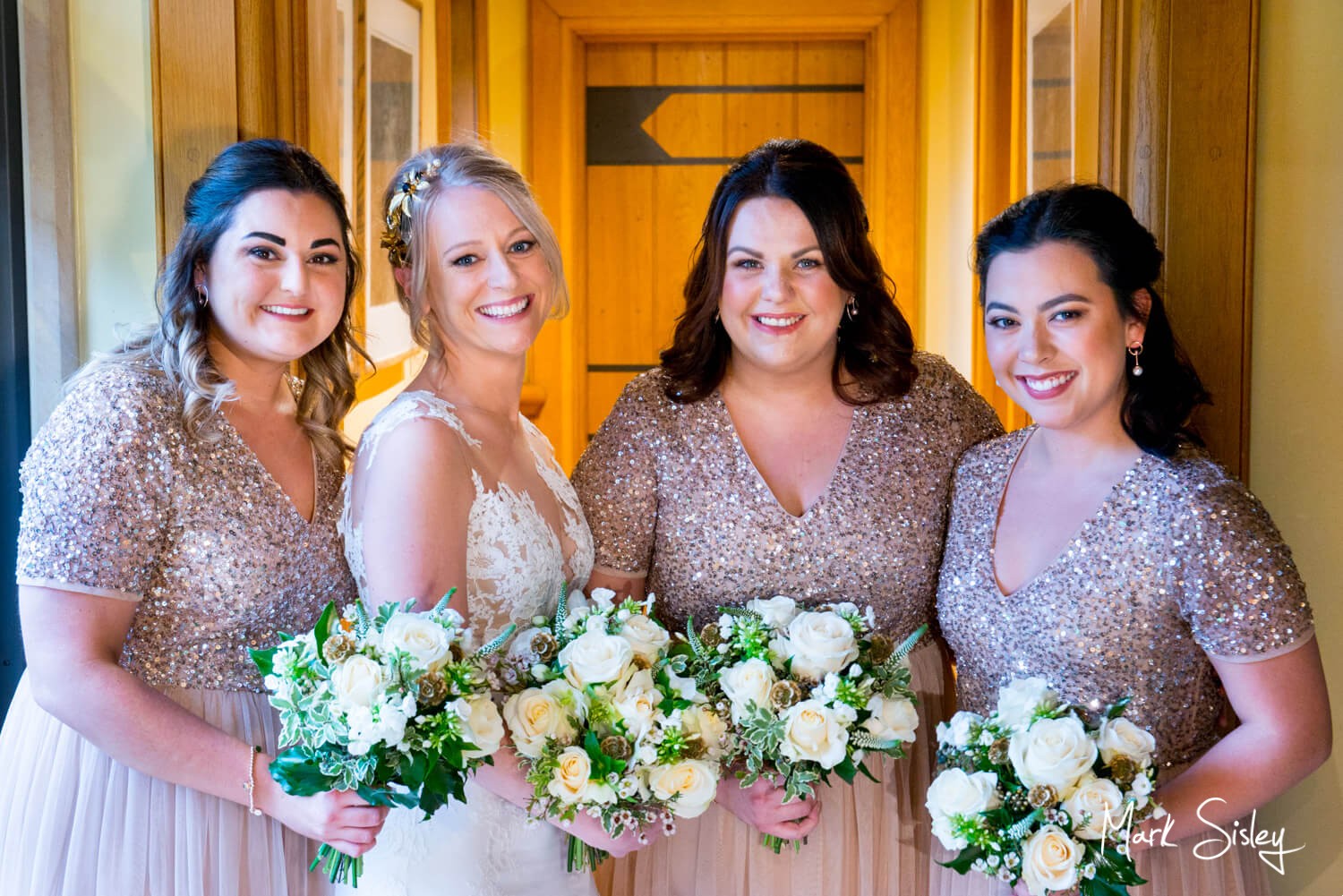 Bride & her bridesmaids at her Waddesdon Dairy winter wedding