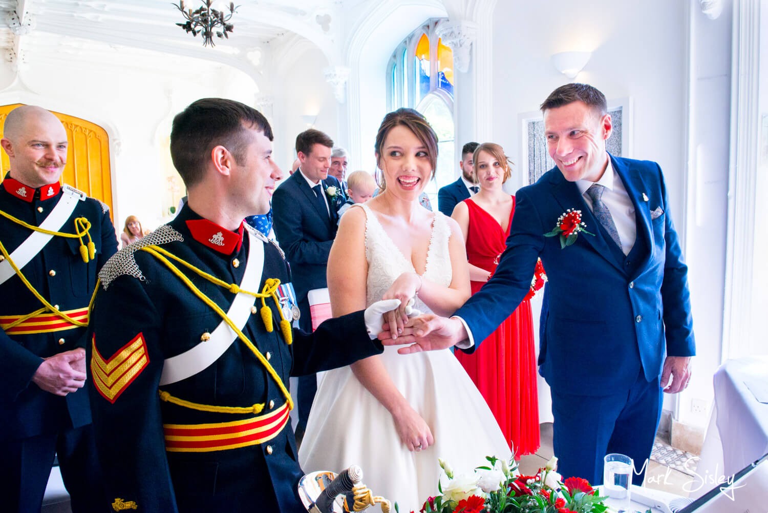 A proud father gives his daughter away at Missenden Abbey military wedding