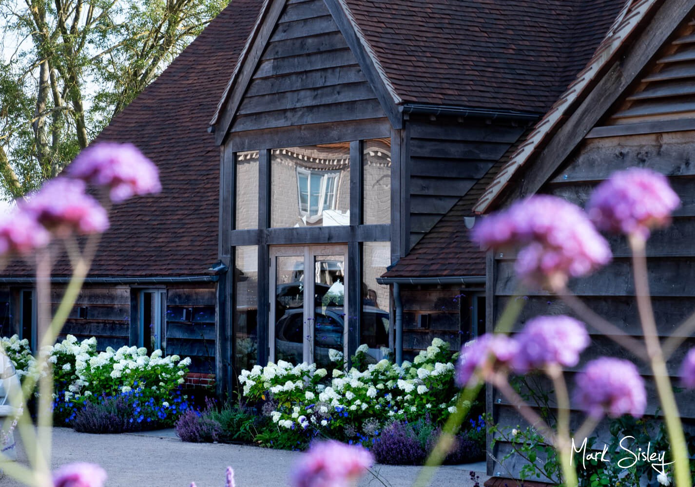 Rackleys Barn Wedding Photography (31) The front of Rackleys wedding barn is beautifully landscaped with fabulous flower borders