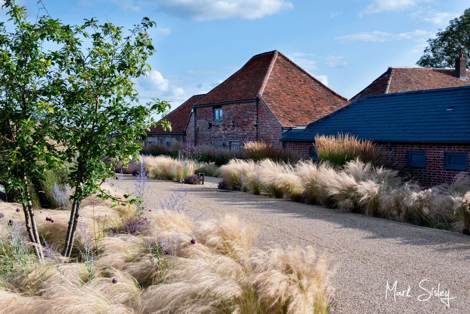 Rackleys Barn Wedding Photography (32) Rackleys Barn has a car park that is landscaped beautifully with fabulous tall grasses and the most divine prairy planting scheme for your wedding day