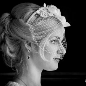 Black and white portrait of bride at Brocket Hall wedding