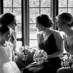 Black and white wedding photography in Buckinghamshire - silhouette image of bridesmaids at Nether Winchendon House