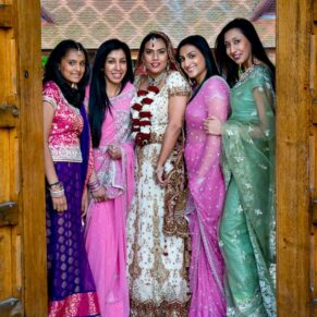 Classic wedding photography Buckinghamshire of the bride with her bridesmaids at The Dairy, Waddesdon