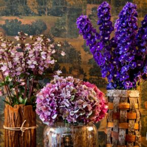 Rustic floral arrangements at Covent Garden Hotel wedding