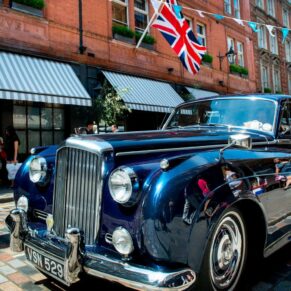 The gorgeous old wedding car parked up outside the Covent Garden Hotel in Central London