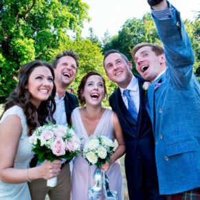 Fun informal picture of wedding guests at Taplow House Hotel wedding