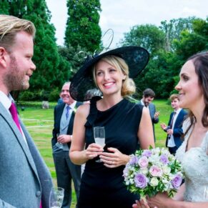 Fun informal image of wedding guests at Taplow House Hotel wedding