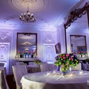 Photography of Taplow House Hotel laid out for an evening wedding breakfast