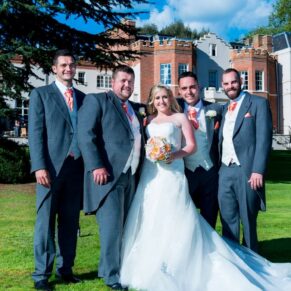 Bridal party on lawn at Taplow House wedding