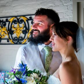 Five Arrows Hotel Waddesdon wedding photography of the newlyweds lit by directional light