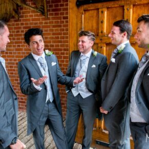 The lads enjoying some banter pre ceremony at Dairy Waddesdon Manor weddingDairy Waddesdon Manor wedding