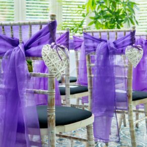 Oakley Court wedding photography of the ribbons on the chairs for the ceremony