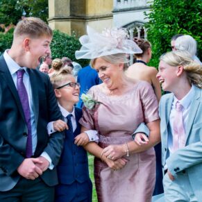 Missenden Abbey wedding picture of the guests enjoying a giggle