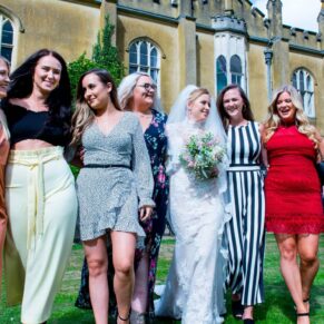 Missenden Abbey wedding shot of the ladies walking through the grounds