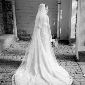 Missenden Abbey wedding pose of the bride in the summerhouse