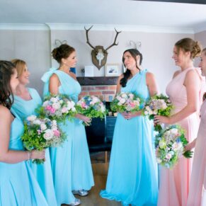 Bridesmaids getting ready at Notley Tythe Barn wedding