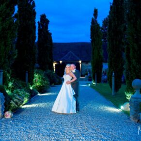 Notley Tythe Barn wedding venue at dusk