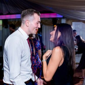 Notley Tythe Barn wedding guests during the evening reception