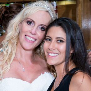 Bride with her friend at Notley Tythe Barn wedding