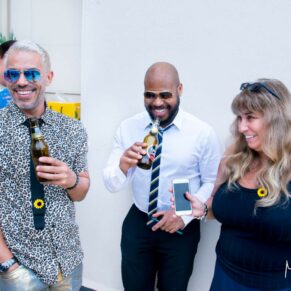 Guests enjoying the banter at Taplow House Hotel same sex wedding