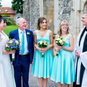 Chatting to the vicar at St Mary's Chesham Church wedding