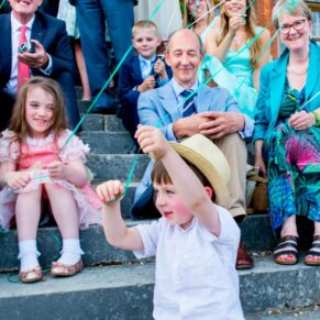 Young boy with balloon at Latimer Estate wedding