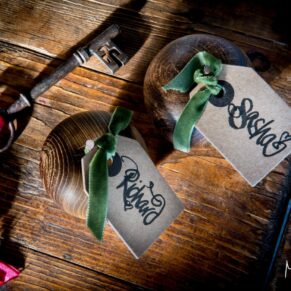 Rustic wooden name place settings for every guest at the Bay Tree Hotel