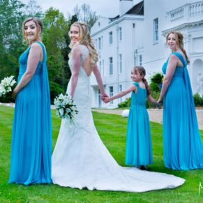 Photography of the ladies looking back at the camera for this lovely relaxed pose during this Beaumont Estate summer wedding