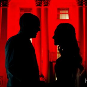 Atmospheric silhouette photography of the bride & groom at dusk in front of the White House at their Beaumont Estate wedding