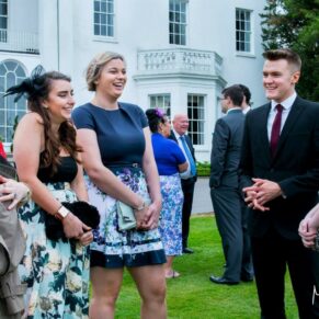 Lively banter captured between friends during the wedding drinks reception at this Beaumont Estate wedding 
