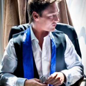 Brocket Hall wedding photography - one of the usher's chilling out before the ceremony