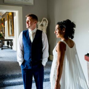 Cliveden House wedding photography captured in the grand curved corridor 