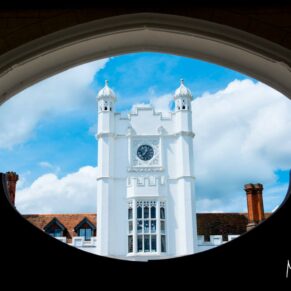 The hotel exterior captured through one of the many archways